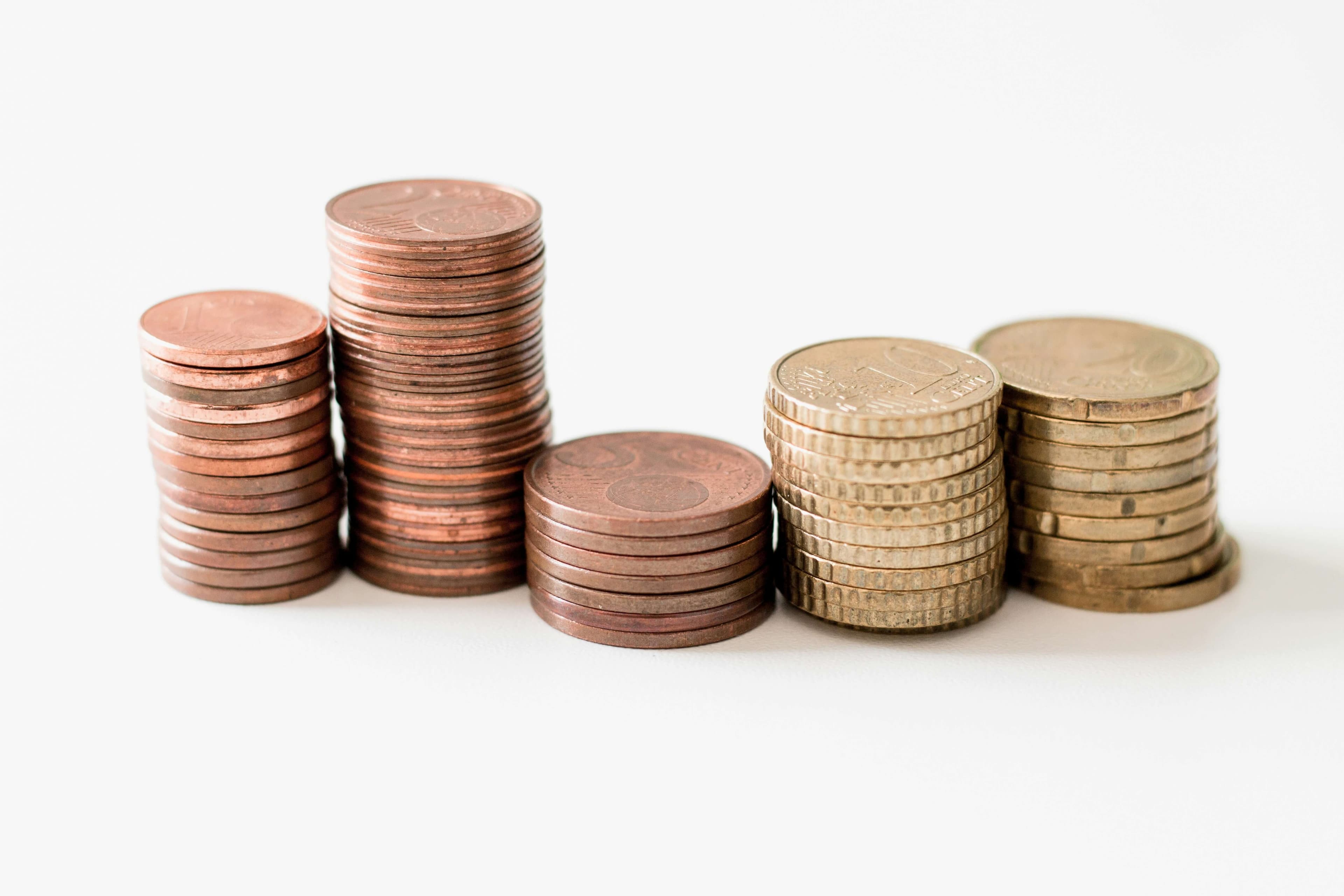 Coins on the table. Financial growth.